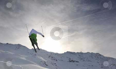 To use this stock image in your creative project, please select the size you need over to the right and click the "Add to Cart" button.
Your downloaded image will come with the Cutcaster watermark removed so don’t worry about the watermark you see on this page. Extreme freestyle ski jump stock photo, extreme freestyle ski jump with young man at mountain in snow park at winter season by Benis Arapovic