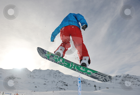 To use this stock image in your creative project, please select the size you need over to the right and click the "Add to Cart" button.
Your downloaded image will come with the Cutcaster watermark removed so don’t worry about the watermark you see on this page. Snowboarder extreme jump stock photo, snowboard winter sport extreme jump by Benis Arapovic