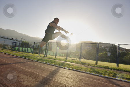 Young athlete running Young athlete running stock photo, young healthy man run on athletic race sport track and representing concept of sort and speed by Benis Arapovic