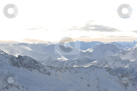 To use this stock image in your creative project, please select the size you need over to the right and click the "Add to Cart" button.
Your downloaded image will come with the Cutcaster watermark removed so don’t worry about the watermark you see on this page. Mountain snow sunset stock photo, mountain snow fresh sunset at ski resort in france val thorens by Benis Arapovic