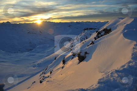 To use this stock image in your creative project, please select the size you need over to the right and click the "Add to Cart" button.
Your downloaded image will come with the Cutcaster watermark removed so don’t worry about the watermark you see on this page. Mountain snow ski sunset stock photo, mountain snow ski with beautiful sunset in background by Benis Arapovic