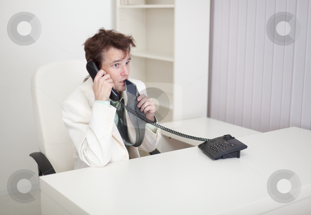 To use this stock image in your creative project, please select the size you need over to the right and click the "Add to Cart" button.
Your downloaded image will come with the Cutcaster watermark removed so don’t worry about the watermark you see on this page. Businessman speaks on phone, worries and eats tie stock photo, The businessman speaks on the phone, worries and eats the tie by Alexey Romanov