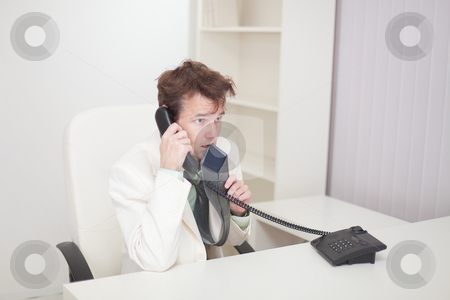 To use this stock image in your creative project, please select the size you need over to the right and click the "Add to Cart" button.
Your downloaded image will come with the Cutcaster watermark removed so don’t worry about the watermark you see on this page. Guy worries speaking by phone with chief stock photo, The guy worries speaking by phone with the chief by Alexey Romanov