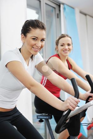 Woman workout in fitness club on running track Woman workout in fitness club on running track stock photo, young woman exercise fitness and workout while run on track in sport club by Benis Arapovic