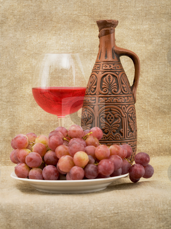 Bright still life with wine Bright still life with wine stock photo, Bright still life with grapes and wine on sacking background by Alexey Romanov
