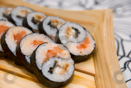 To use this stock image in your creative project, please select the size you need over to the right and click the "Add to Cart" button.
Your downloaded image will come with the Cutcaster watermark removed so don’t worry about the watermark you see on this page. Set of sushi stock photo, Set of sushi on wood plate. by olinchuk