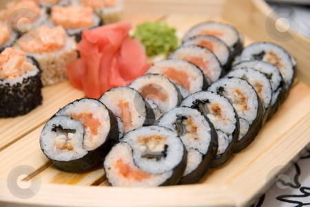 To use this stock image in your creative project, please select the size you need over to the right and click the "Add to Cart" button.
Your downloaded image will come with the Cutcaster watermark removed so don’t worry about the watermark you see on this page. Sushi on wood plate stock photo, Set of sushi on wood plate. by olinchuk