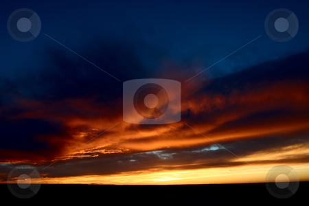 Set sun lighting up storm clouds Set sun lighting up storm clouds stock photo, Set sun lighting up storm clouds by Mark Duffy