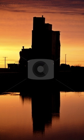 To use this stock image in your creative project, please select the size you need over to the right and click the "Add to Cart" button.
Your downloaded image will come with the Cutcaster watermark removed so don’t worry about the watermark you see on this page. Eyebrow gain elevator reflected off water after sunset stock photo, Eyebrow gain elevator reflected off water after sunset by Mark Duffy