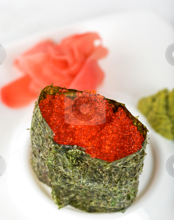 To use this stock image in your creative project, please select the size you need over to the right and click the "Add to Cart" button.
Your downloaded image will come with the Cutcaster watermark removed so don’t worry about the watermark you see on this page. Red tobiko sushi stock photo, Red tobiko (flying fish roe) sushi closeup by olinchuk