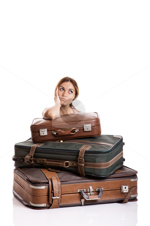 To use this stock image in your creative project, please select the size you need over to the right and click the "Add to Cart" button.
Your downloaded image will come with the Cutcaster watermark removed so don’t worry about the watermark you see on this page. Thinking on the vacations stock photo, Beautiful young woman behind the baggage thinking on the vacations, isolated on white background by ikostudio