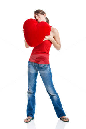 To use this stock image in your creative project, please select the size you need over to the right and click the "Add to Cart" button.
Your downloaded image will come with the Cutcaster watermark removed so don’t worry about the watermark you see on this page. Valentine woman stock photo, Beautiful young woman holding a red heart, Valentine concept by ikostudio