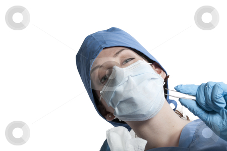 Beautiful Woman Surgeon Beautiful Woman Surgeon stock photo, A beautiful young woman surgeon performing surgery by Robert Byron