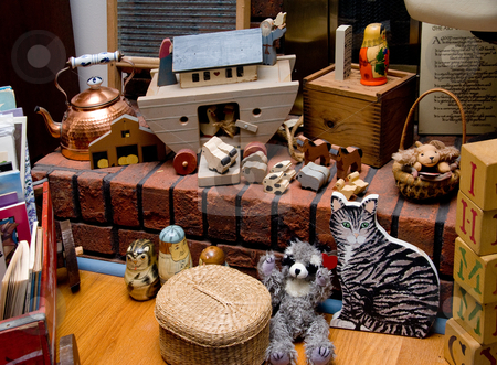 To use this stock image in your creative project, please select the size you need over to the right and click the "Add to Cart" button.
Your downloaded image will come with the Cutcaster watermark removed so don’t worry about the watermark you see on this page. Antique Toys stock photo, A collection of antique toys on a fireplace hearth. by Robert Byron