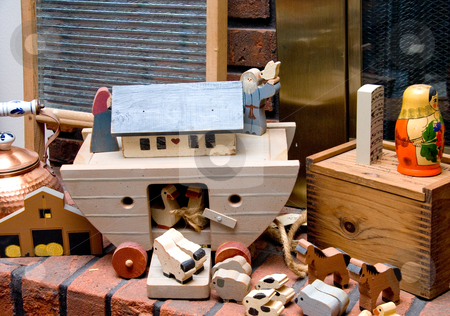 To use this stock image in your creative project, please select the size you need over to the right and click the "Add to Cart" button.
Your downloaded image will come with the Cutcaster watermark removed so don’t worry about the watermark you see on this page. Antique Toys stock photo, Noahs Ark Toys on a fireplace hearth. by Robert Byron