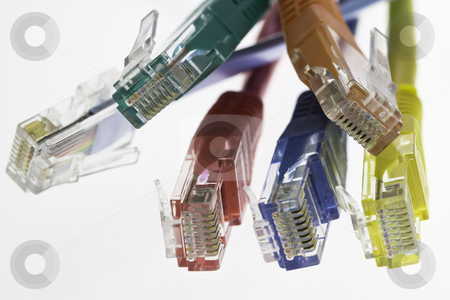 To use this stock image in your creative project, please select the size you need over to the right and click the "Add to Cart" button.
Your downloaded image will come with the Cutcaster watermark removed so don’t worry about the watermark you see on this page. Detail of five network cables and a flat cable configuration stock photo, detail of five network cables and a flat cable configuration on a white background by ludinko