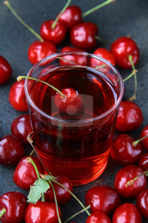 To use this stock image in your creative project, please select the size you need over to the right and click the "Add to Cart" button.
Your downloaded image will come with the Cutcaster watermark removed so don’t worry about the watermark you see on this page. Glass of fresh cherry juice and fresh cherries stock photo, glass of fresh cherry juice and fresh cherries by Olga Kriger