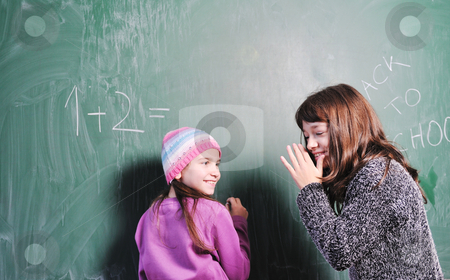 Happy young school girl portrait Happy young school girl portrait stock photo, happy young school girl portrait on math class by Benis Arapovic