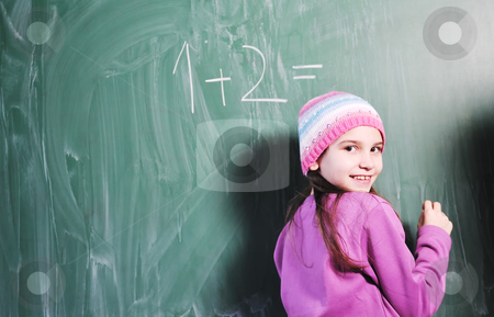 To use this stock image in your creative project, please select the size you need over to the right and click the "Add to Cart" button.
Your downloaded image will come with the Cutcaster watermark removed so don’t worry about the watermark you see on this page. Happy young school girl portrait stock photo, happy young school girl portrait on math class by Benis Arapovic