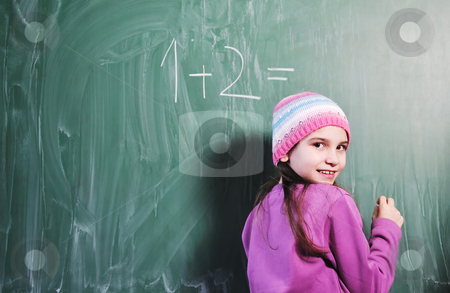 To use this stock image in your creative project, please select the size you need over to the right and click the "Add to Cart" button.
Your downloaded image will come with the Cutcaster watermark removed so don’t worry about the watermark you see on this page. Happy young school girl portrait stock photo, happy young school girl portrait on math class by Benis Arapovic