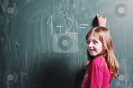 Happy young school girl portrait Happy young school girl portrait stock photo, happy young school girl portrait on math class by Benis Arapovic
