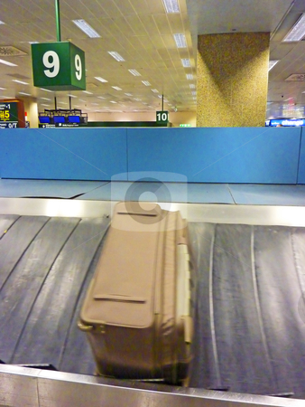 To use this stock image in your creative project, please select the size you need over to the right and click the "Add to Cart" button.
Your downloaded image will come with the Cutcaster watermark removed so don’t worry about the watermark you see on this page. Louggagge in carousel stock photo, Lost luggage on a airport carousel, in movement by Perseomedusa