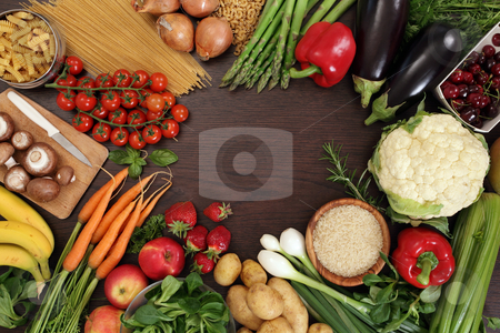 To use this stock image in your creative project, please select the size you need over to the right and click the "Add to Cart" button.
Your downloaded image will come with the Cutcaster watermark removed so don’t worry about the watermark you see on this page. Healthy eating frame stock photo, Photo of a table top full of fresh vegetables, fruit, and other healthy foods with a space in the middle for text. by © Ron Sumners