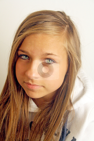 To use this stock image in your creative project, please select the size you need over to the right and click the "Add to Cart" button.
Your downloaded image will come with the Cutcaster watermark removed so don’t worry about the watermark you see on this page. Depressed teenage girl stock photo, a pretty teenage girl looking depressed by lizapixels