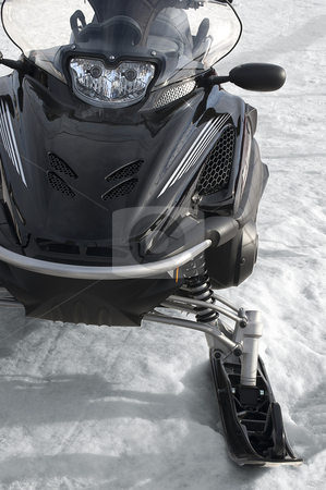 Snowmobile Snowmobile stock photo, photo of a black snowmobile on a snowy by catalby