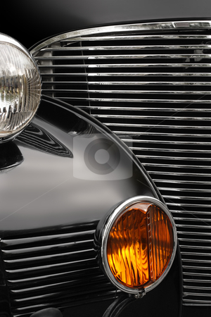 To use this stock image in your creative project, please select the size you need over to the right and click the "Add to Cart" button.
Your downloaded image will come with the Cutcaster watermark removed so don’t worry about the watermark you see on this page. Antique car grill stock photo, The chrome grill and headlights of an antique classic car. by © Ron Sumners