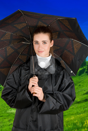To use this stock image in your creative project, please select the size you need over to the right and click the "Add to Cart" button.
Your downloaded image will come with the Cutcaster watermark removed so don’t worry about the watermark you see on this page. Umbrella stock photo, pretty brunette girl at black coat under umbrella by olinchuk
