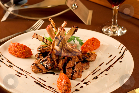 To use this stock image in your creative project, please select the size you need over to the right and click the "Add to Cart" button.
Your downloaded image will come with the Cutcaster watermark removed so don’t worry about the watermark you see on this page. Roasted lamb chops stock photo, Roasted lamb chops with vegetables on decorated table by olinchuk
