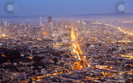 To use this stock image in your creative project, please select the size you need over to the right and click the "Add to Cart" button.
Your downloaded image will come with the Cutcaster watermark removed so don’t worry about the watermark you see on this page. Downtown San Francisco at Dusk stock photo, Downtown San Francisco at dusk as the city lights come up. by Bryan Mullennix