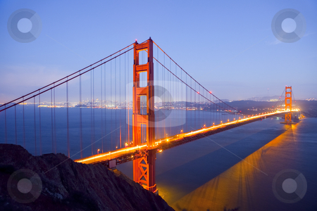 To use this stock image in your creative project, please select the size you need over to the right and click the "Add to Cart" button.
Your downloaded image will come with the Cutcaster watermark removed so don’t worry about the watermark you see on this page. Golden Gate Bridge at Night stock photo, Golden Gate Bridge at Night with San Francisco Skyline, long exposure by Bryan Mullennix