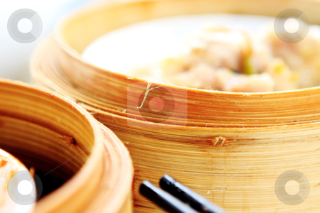To use this stock image in your creative project, please select the size you need over to the right and click the "Add to Cart" button.
Your downloaded image will come with the Cutcaster watermark removed so don’t worry about the watermark you see on this page. Chinese dim sum stock photo, chinese dim sum,foucs on the bamboo steamer by Keng po Leung