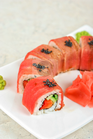 To use this stock image in your creative project, please select the size you need over to the right and click the "Add to Cart" button.
Your downloaded image will come with the Cutcaster watermark removed so don’t worry about the watermark you see on this page. Fuji Sushi rolls stock photo, Fuji Sushi rolls made of tuna, pepper, avocado, cucumber by olinchuk