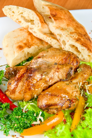 To use this stock image in your creative project, please select the size you need over to the right and click the "Add to Cart" button.
Your downloaded image will come with the Cutcaster watermark removed so don’t worry about the watermark you see on this page. Roasted chicken drumstick stock photo, roasted chicken drumstick garnished with fresh green salad, pepper and greens by olinchuk