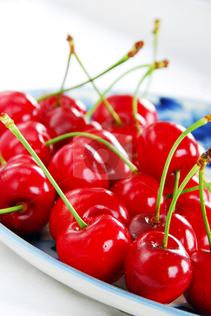 To use this stock image in your creative project, please select the size you need over to the right and click the "Add to Cart" button.
Your downloaded image will come with the Cutcaster watermark removed so don’t worry about the watermark you see on this page. Appetizing red cherries stock photo, appetizing red fresh ripe cherries on blue plate by Julija Sapic