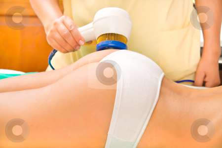 Woman enjoying the treatment in a Spa center Woman enjoying the treatment in a Spa center stock photo, Relaxed woman enjoying the treatment in a Spa center by marcelozippo