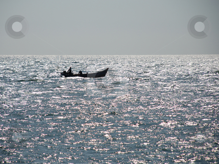 To use this stock image in your creative project, please select the size you need over to the right and click the "Add to Cart" button.
Your downloaded image will come with the Cutcaster watermark removed so don’t worry about the watermark you see on this page. Boat and Glittering Sea stock photo, Fishermen are returning in the afternoon. by selimgoksu