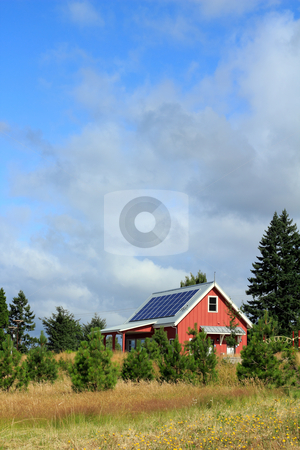 To use this stock image in your creative project, please select the size you need over to the right and click the "Add to Cart" button.
Your downloaded image will come with the Cutcaster watermark removed so don’t worry about the watermark you see on this page. Natural Power stock photo, Small, red public park building with solar panels on the metal rooftop on a mostly sunny summer day. by Lee Serenethos