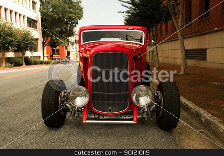 To use this stock image in your creative project, please select the size you need over to the right and click the "Add to Cart" button.
Your downloaded image will come with the Cutcaster watermark removed so don’t worry about the watermark you see on this page. Roadster stock photo, Roadster parked on a city street by Jack Schiffer