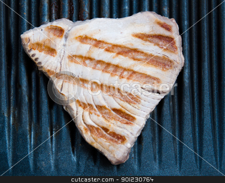 To use this stock image in your creative project, please select the size you need over to the right and click the "Add to Cart" button.
Your downloaded image will come with the Cutcaster watermark removed so don’t worry about the watermark you see on this page. Tuna Steak Cooking On A Grill stock photo, Tuna fish steak cooking on a grill by Frank G?