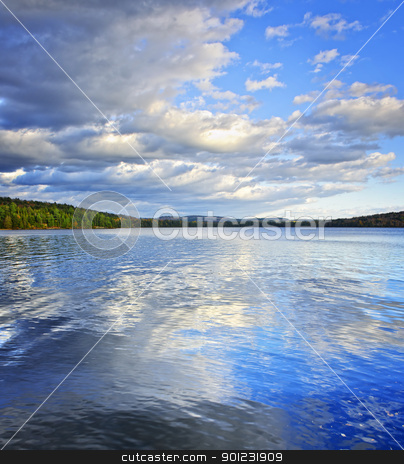 To use this stock image in your creative project, please select the size you need over to the right and click the "Add to Cart" button.
Your downloaded image will come with the Cutcaster watermark removed so don’t worry about the watermark you see on this page. Lake reflecting sky stock photo, Lake of Two Rivers reflecting blue sky and clouds in Algonquin Park, Canada by Elena Elisseeva