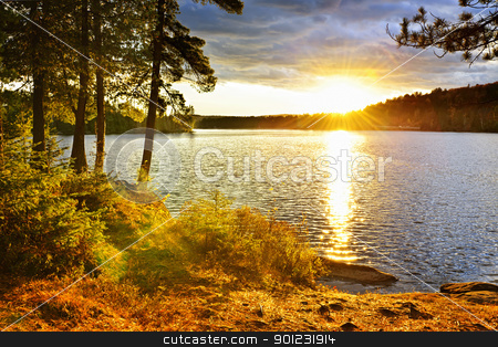 To use this stock image in your creative project, please select the size you need over to the right and click the "Add to Cart" button.
Your downloaded image will come with the Cutcaster watermark removed so don’t worry about the watermark you see on this page. Sunset over lake stock photo, Sunset over Lake of Two Rivers in Algonquin Park, Ontario, Canada by Elena Elisseeva