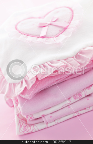 To use this stock image in your creative project, please select the size you need over to the right and click the "Add to Cart" button.
Your downloaded image will come with the Cutcaster watermark removed so don’t worry about the watermark you see on this page. Pink baby clothes for infant girl stock photo, Pink infant girl clothing for baby shower by Elena Elisseeva