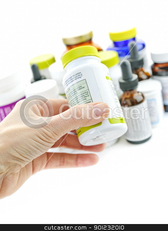 To use this stock image in your creative project, please select the size you need over to the right and click the "Add to Cart" button.
Your downloaded image will come with the Cutcaster watermark removed so don’t worry about the watermark you see on this page. Hand holding medicine bottle stock photo, Hand holding medicine bottle to read label by Elena Elisseeva