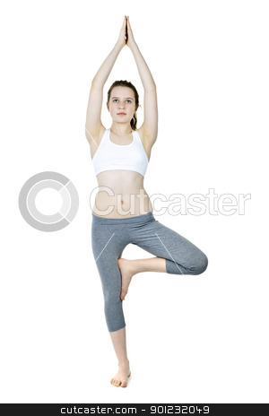 To use this stock image in your creative project, please select the size you need over to the right and click the "Add to Cart" button.
Your downloaded image will come with the Cutcaster watermark removed so don’t worry about the watermark you see on this page. Fit girl doing tree yoga pose stock photo, Healthy young woman doing tree yoga pose isolated on white by Elena Elisseeva