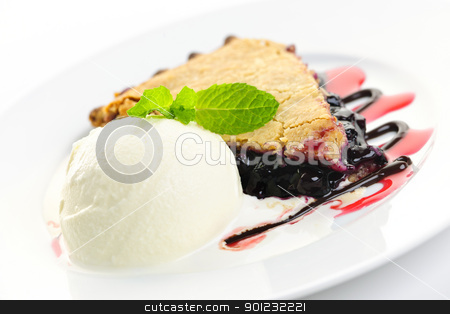 To use this stock image in your creative project, please select the size you need over to the right and click the "Add to Cart" button.
Your downloaded image will come with the Cutcaster watermark removed so don’t worry about the watermark you see on this page. Blueberry pie and ice cream stock photo, Slice of blueberry pie and vanilla ice cream served with dessert sauces by Elena Elisseeva