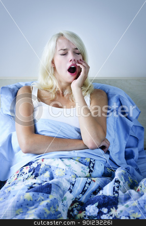To use this stock image in your creative project, please select the size you need over to the right and click the "Add to Cart" button.
Your downloaded image will come with the Cutcaster watermark removed so don’t worry about the watermark you see on this page. Woman yawning in bed stock photo, Sleepy blonde woman yawning sitting up in bed by Elena Elisseeva
